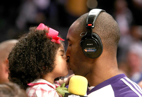 Kobe Bryant planted a kiss on his daughter, Gianna, following their 92-75
